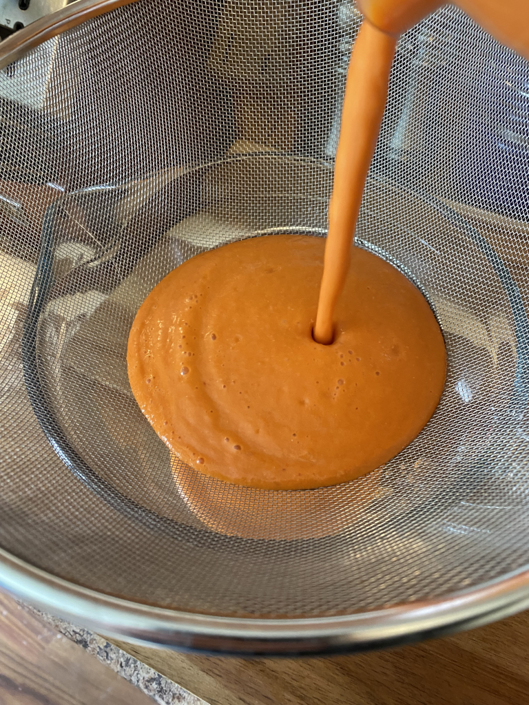 Strain soup into bowl.